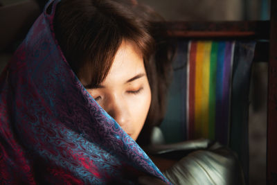 Close-up of eyes closed woman at home 