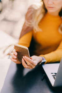 Young woman using mobile phone