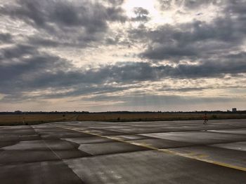 Road against cloudy sky