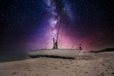 Scenic view of sea against sky at night