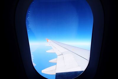 Cropped image of airplane wing