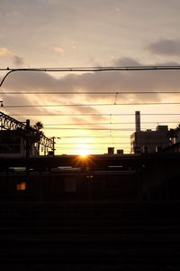 Silhouette of buildings at sunset