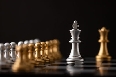 Close-up of chess pieces against blurred background