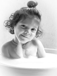 Portrait of cute girl in bathroom