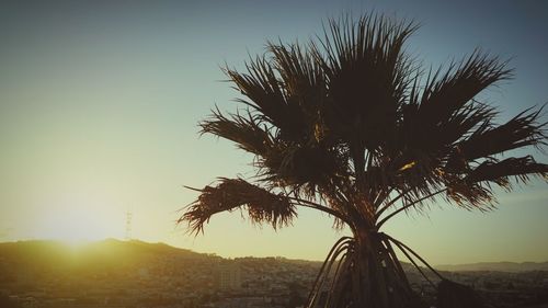 Scenic view of landscape against sky at sunset