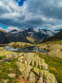 Scenic view of landscape and mountains against sky