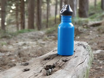 Close-up of green bottle on table