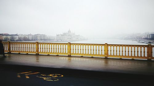 Bridge over water against clear sky