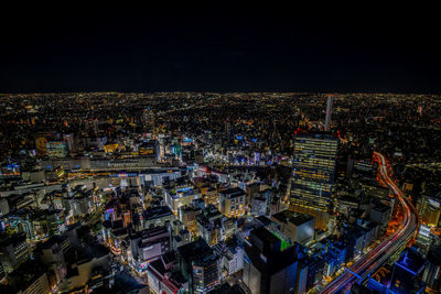 High angle view of ikebukuro city lit up at night