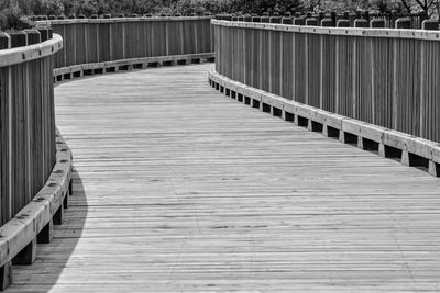 Wooden footbridge on footpath