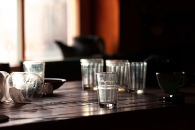 An old, historic, soviet time glasses on the table. indoors photo of drinks in glasses.