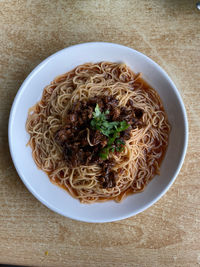 High angle view of noodles in plate on table