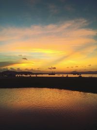 Scenic view of sea at sunset