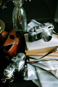 High angle view of old camera on table