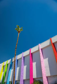 Low angle view of building against clear blue sky