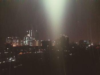 Illuminated cityscape at night