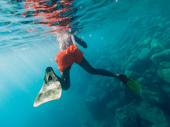 Man swimming in sea