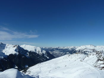 Scenic view of snow covered mountain range