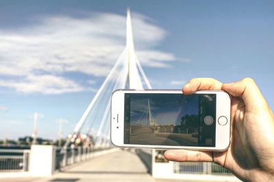 Woman photographing through smart phone