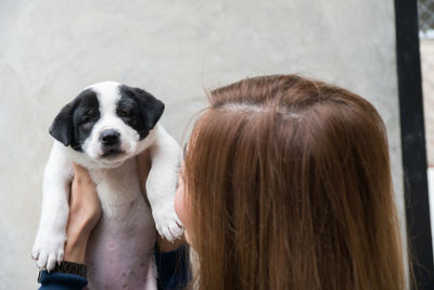 Close-up of woman with dog