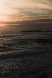 Scenic view of sea against sky during sunset