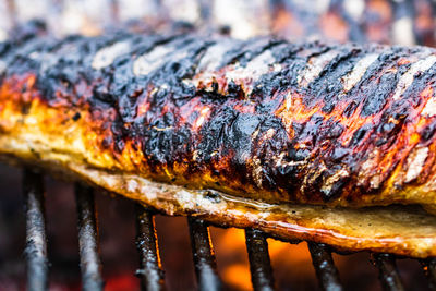 Close-up of meat on barbecue grill