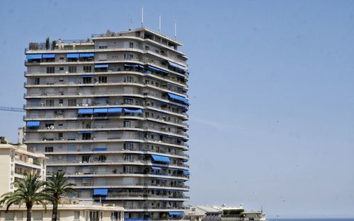 Apartment building against clear sky