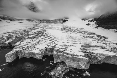 Scenic view of mountain against sky during winter