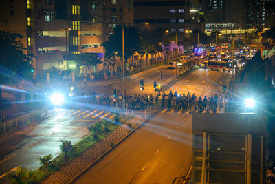 High angle view of people on road at night