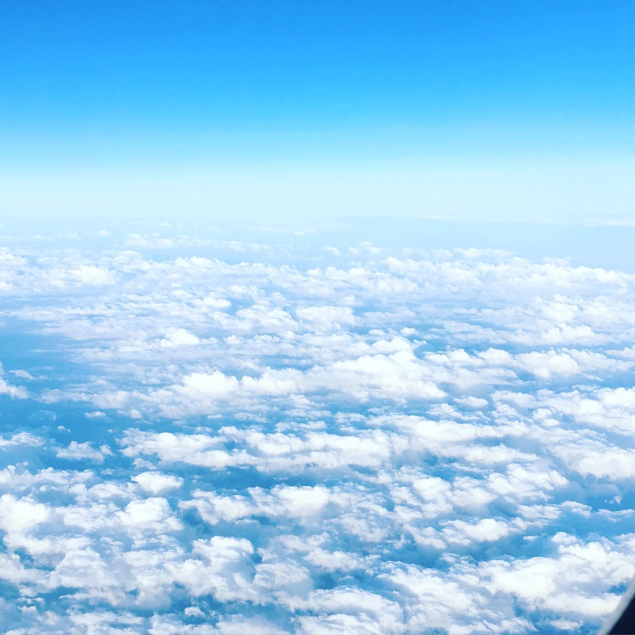 blue, scenics, beauty in nature, aerial view, tranquil scene, sky, tranquility, nature, cloudscape, copy space, idyllic, landscape, cloud - sky, majestic, white color, sky only, cloud, day, airplane, no people