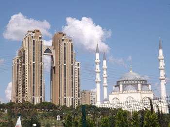 Low angle view of building against blue sky