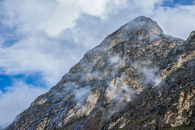 Low angle view of mountain against sky