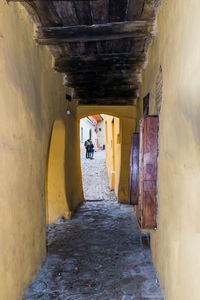 Man walking in tunnel