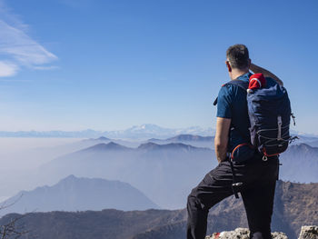 Backpacker in the italian alps