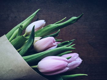 Close-up of purple tulips on table