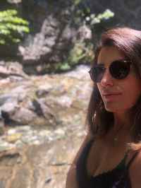 Portrait of young woman wearing sunglasses