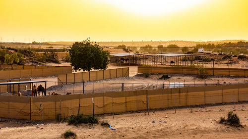 High angle view of townscape against sky at sunset