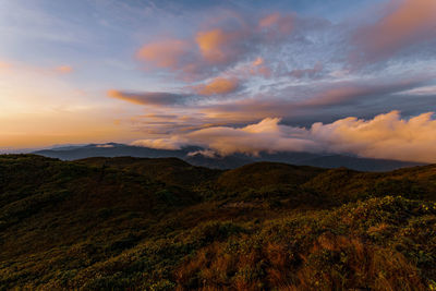 Scenic view of dramatic sky during sunset