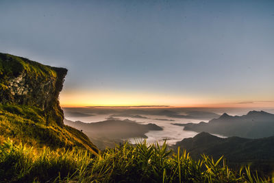 Scenic view of mountains against sky during sunset