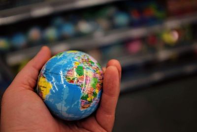 Close-up of hand holding globe