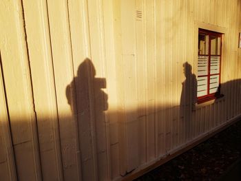 Shadow of man and woman standing outdoors