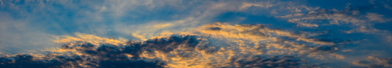 Low angle view of dramatic sky during sunset