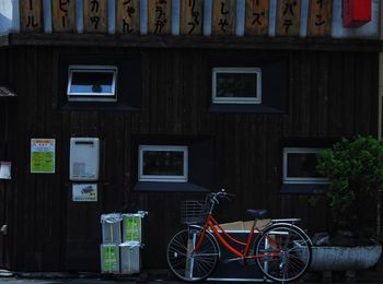 Bicycle parked outside building