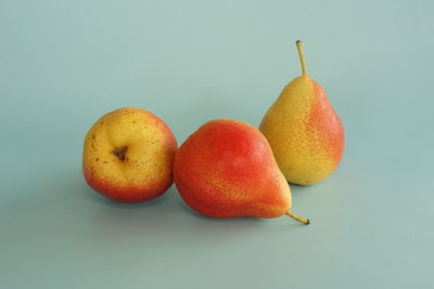 Close-up of fruits against white background