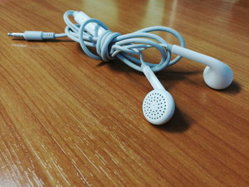 High angle view of telephone on table