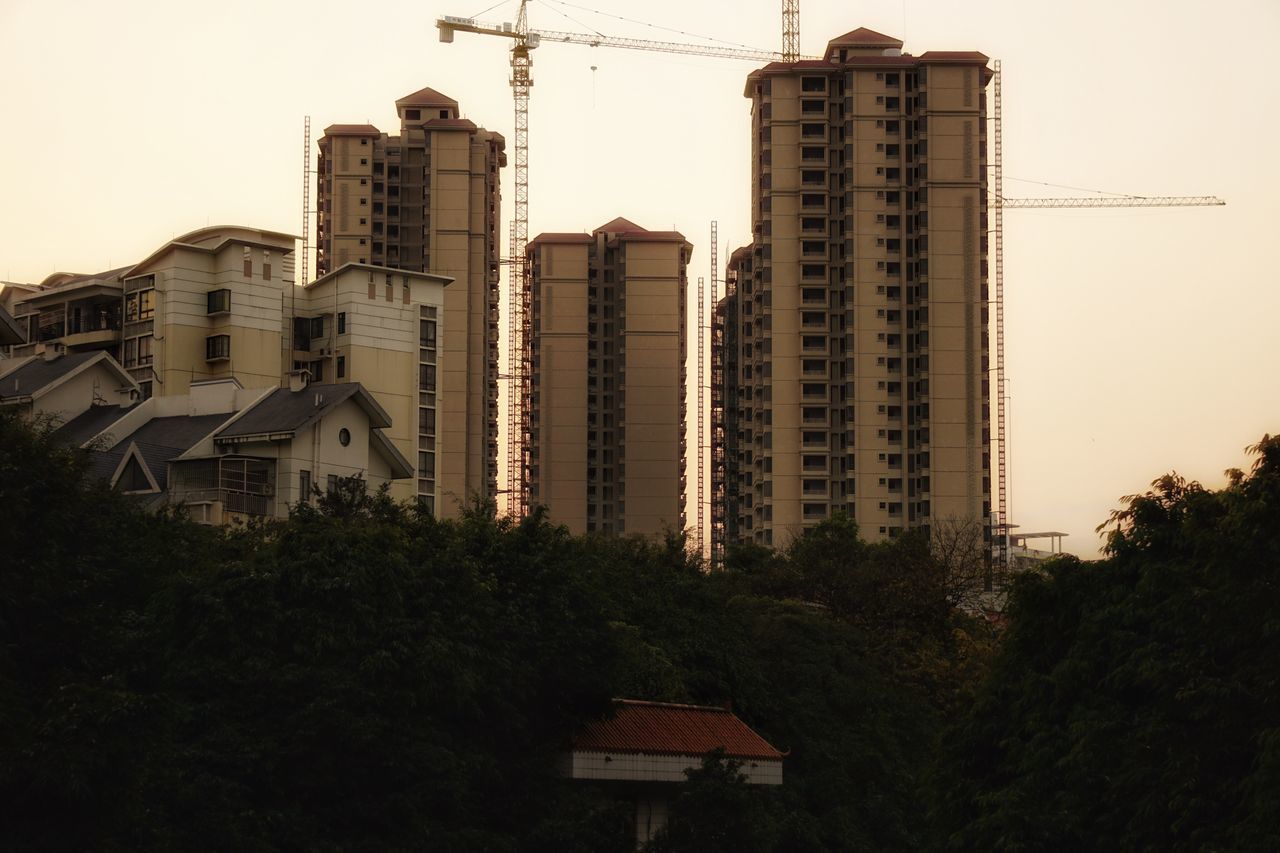 TALL BUILDINGS AGAINST SKY