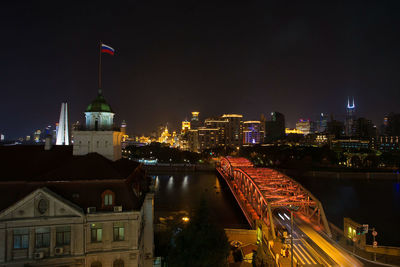 Illuminated buildings in city at night