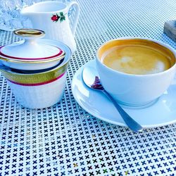 Close-up of coffee cup on table