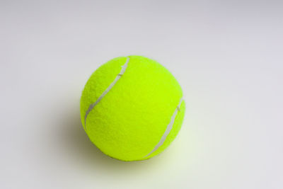 Close-up of green ball on table