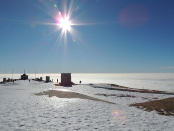 Scenic view of sea against clear sky during winter